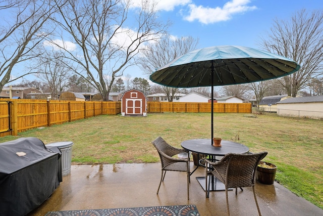 view of patio with a storage unit