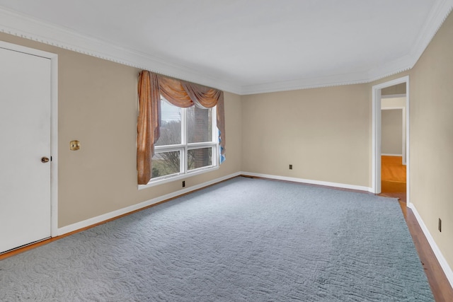 carpeted empty room with ornamental molding