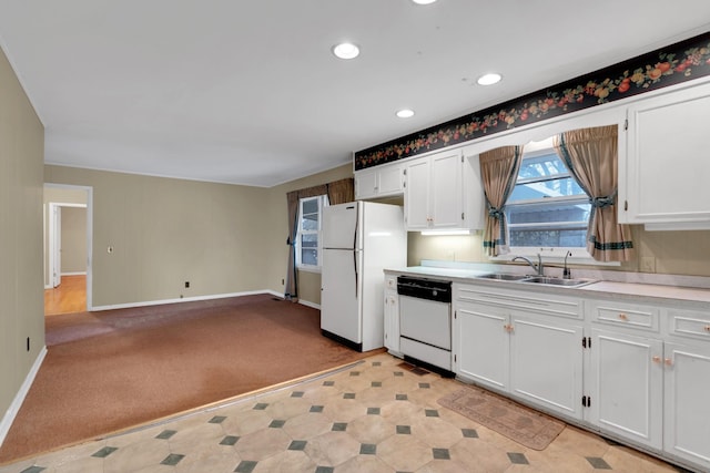 kitchen with white cabinetry, white appliances, and sink