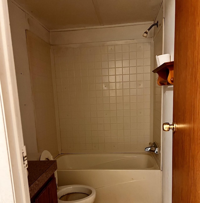 full bathroom featuring vanity, toilet, and tiled shower / bath combo