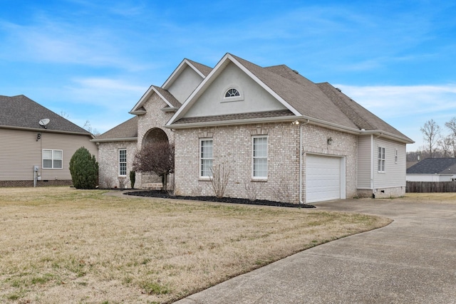 front facade featuring a garage and a front yard