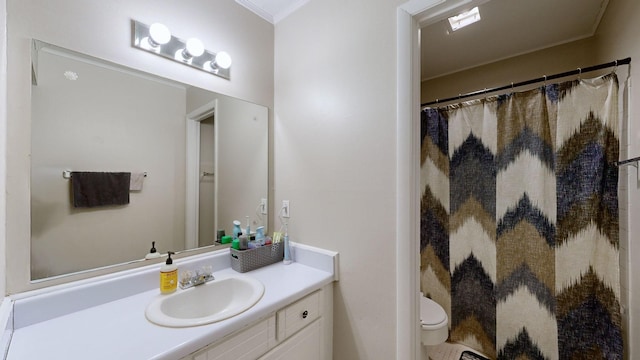 full bathroom with a shower with curtain, crown molding, vanity, and toilet