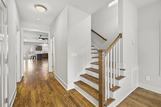 interior space with hardwood / wood-style flooring and ceiling fan