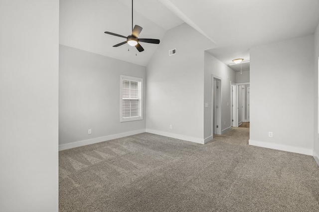 unfurnished room featuring vaulted ceiling, carpet flooring, and ceiling fan