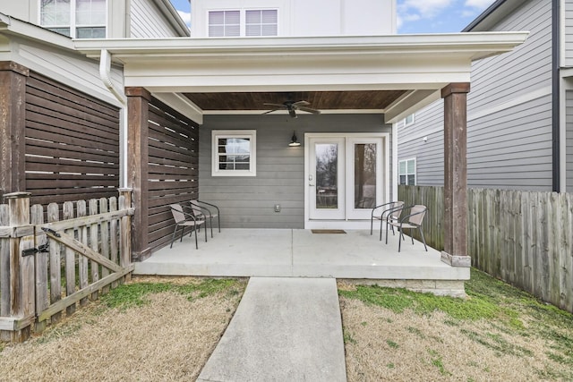 view of patio featuring ceiling fan