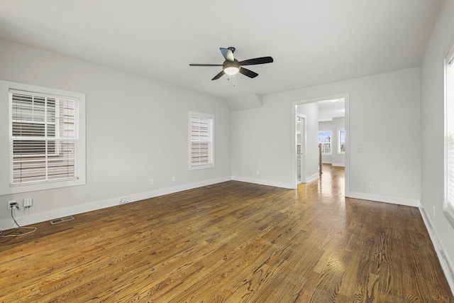 spare room featuring dark hardwood / wood-style floors and ceiling fan