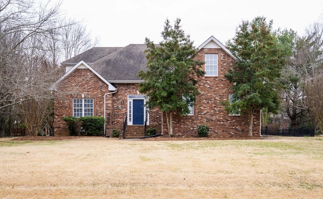 view of front property featuring a front yard