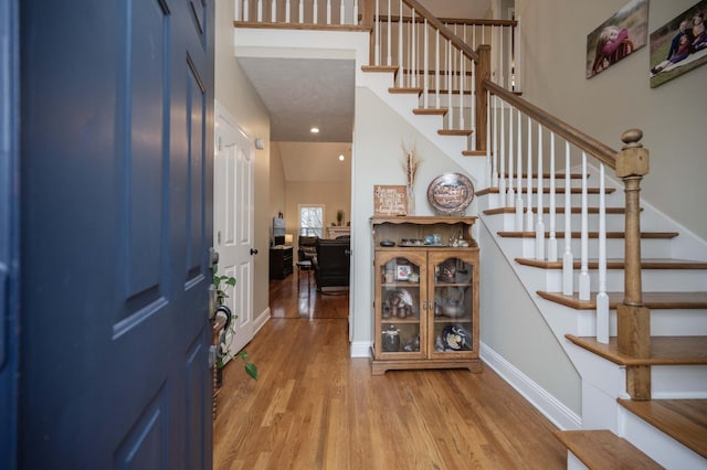 foyer featuring hardwood / wood-style floors