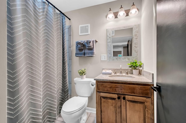 bathroom featuring a shower with curtain, vanity, tile patterned floors, and toilet