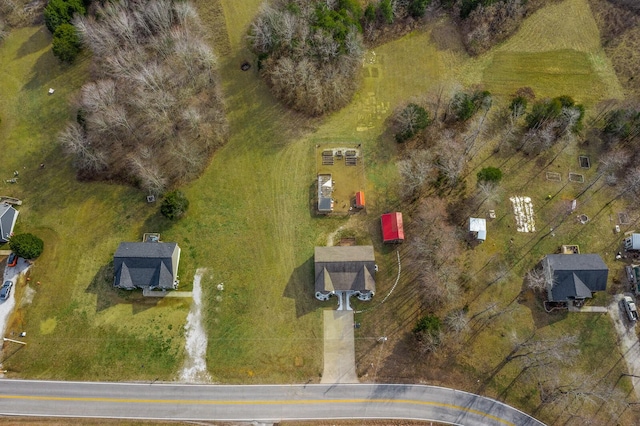 birds eye view of property featuring a rural view