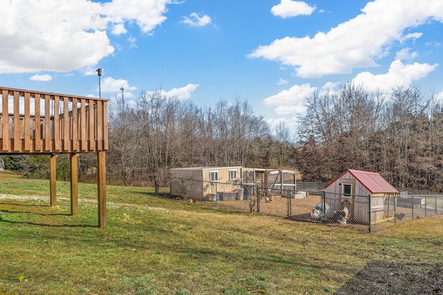 view of yard with an outbuilding and exterior structure