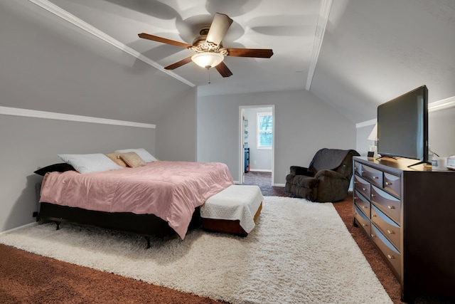 bedroom featuring ceiling fan, lofted ceiling, and dark colored carpet