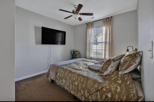 bedroom with ceiling fan and carpet flooring