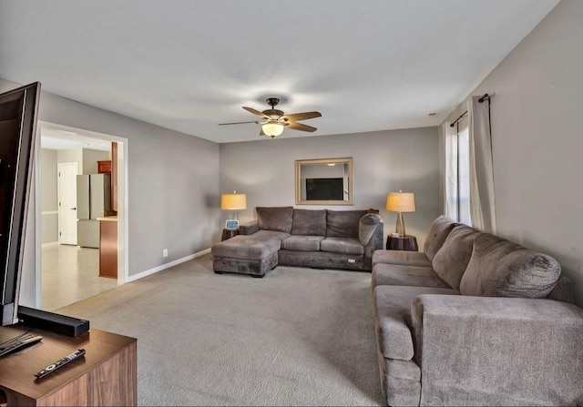 living room with carpet flooring and ceiling fan