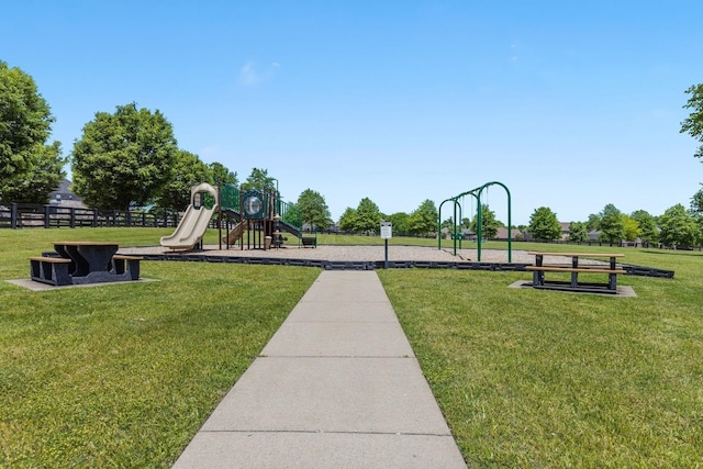 view of play area featuring a lawn