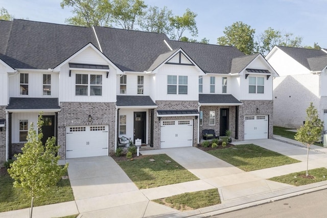 townhome / multi-family property featuring a garage