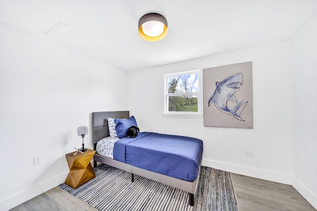 bedroom featuring hardwood / wood-style floors