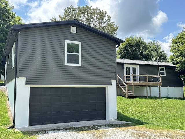 1705 Haire Rd, Dandridge, TN 37725 - back of house with a yard, stairway, driveway, an attached garage, and a deck