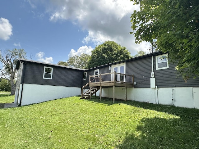 1705 Haire Rd, Dandridge, TN 37725 - back of house featuring a wooden deck, stairway, and a yard