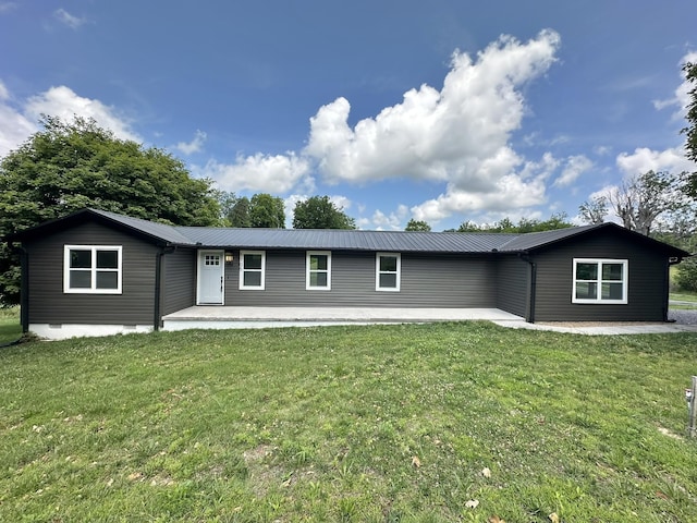 1705 Haire Rd, Dandridge, TN 37725 - back of house with a yard and a metal roof