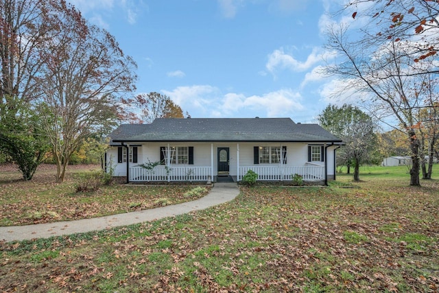 ranch-style home with a porch and a front lawn