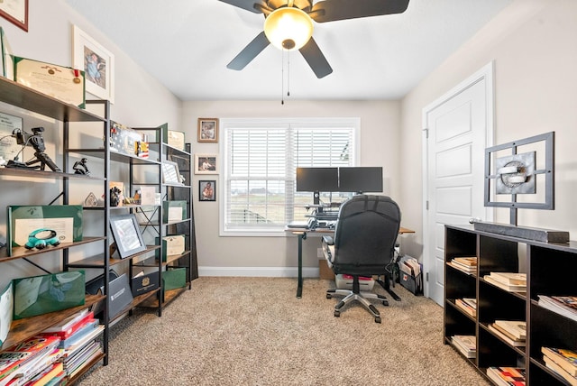 office featuring ceiling fan and light colored carpet