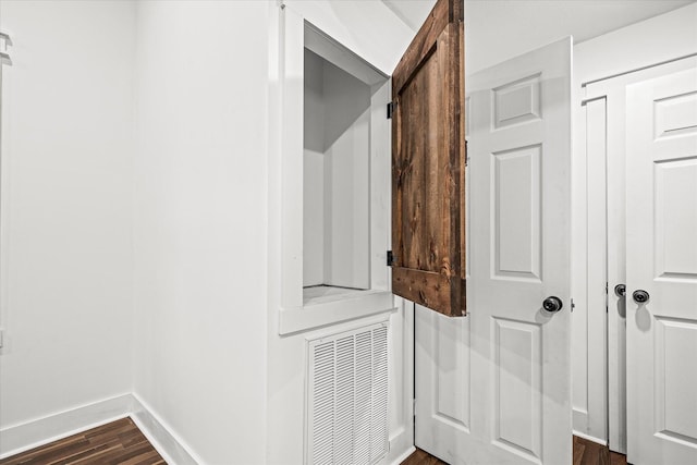 interior space with dark wood-type flooring