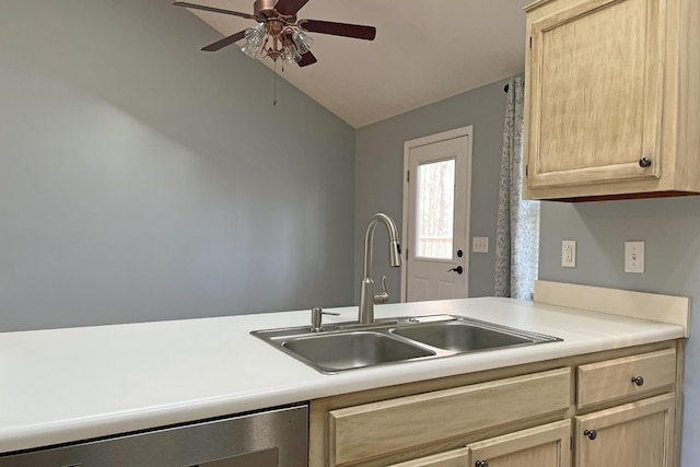 kitchen featuring sink, vaulted ceiling, light brown cabinets, dishwasher, and ceiling fan