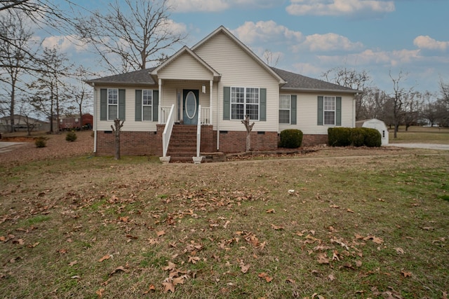 ranch-style home with a front lawn