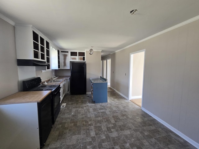 kitchen with black appliances, ornamental molding, open shelves, a sink, and a center island