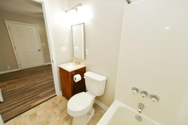 118 Rainbow St, Clarksville, TN 37042 - full bath with toilet, baseboards, wood finished floors, and vanity