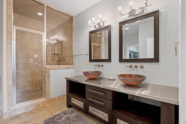 bathroom with an enclosed shower and vanity