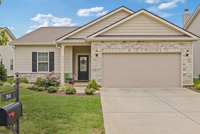 view of front facade featuring a garage and a front lawn