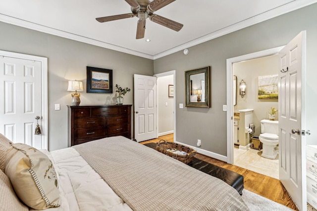 bedroom featuring connected bathroom, crown molding, ceiling fan, and light wood-type flooring