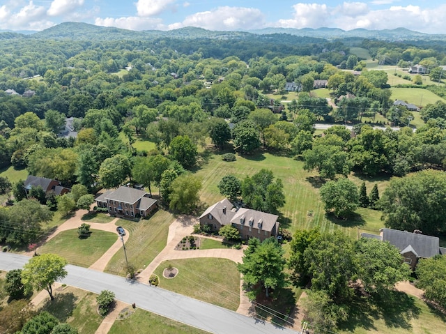 birds eye view of property featuring a mountain view