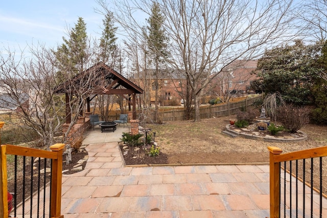 view of patio / terrace with a gazebo and an outdoor fire pit