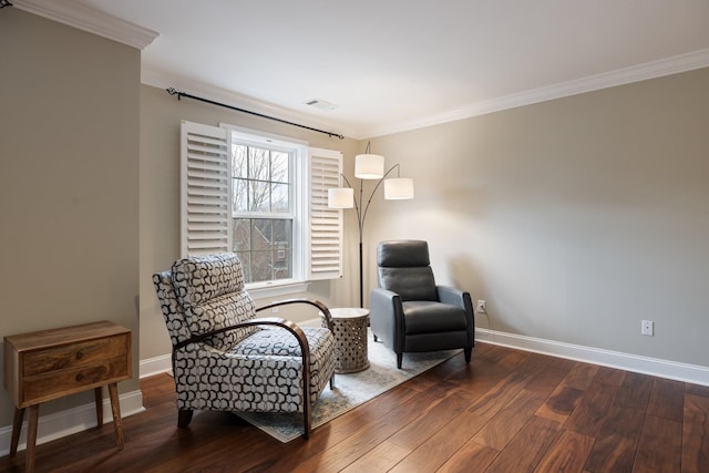 living area featuring ornamental molding and dark hardwood / wood-style flooring