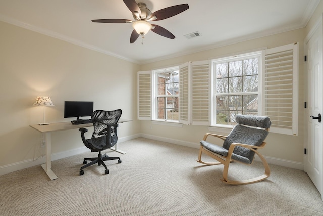 carpeted office with ceiling fan and ornamental molding