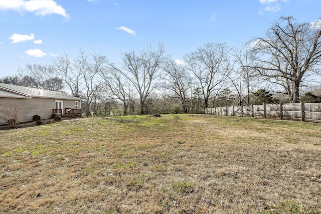 view of yard featuring a wooden deck