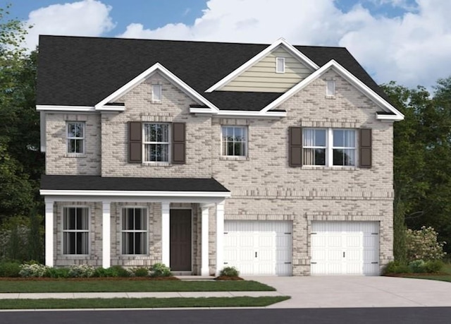 view of front of property featuring a garage, concrete driveway, and brick siding