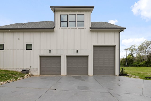 view of side of property featuring a garage