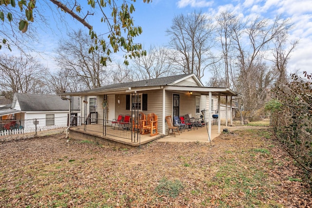 back of house featuring a patio