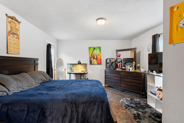 bedroom featuring a textured ceiling