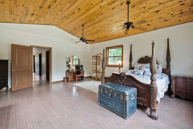 bedroom featuring wood ceiling, vaulted ceiling, and hardwood / wood-style floors