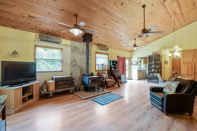 living room with wood ceiling, high vaulted ceiling, an AC wall unit, a wood stove, and light hardwood / wood-style floors