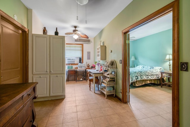 interior space with cooling unit, light tile patterned floors, and a wall mounted AC