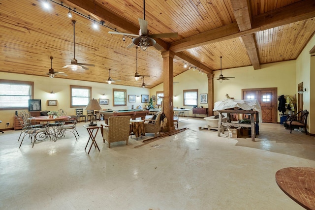 miscellaneous room with beam ceiling, track lighting, wooden ceiling, and high vaulted ceiling