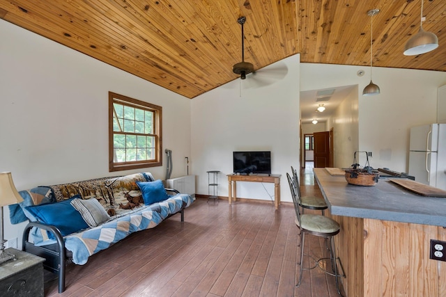 living room featuring high vaulted ceiling, dark wood-type flooring, and wooden ceiling