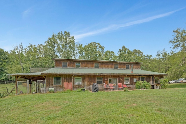 view of front of home featuring a front yard