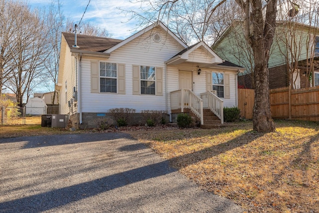 view of front of home with cooling unit